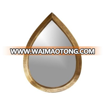 Modern cast metal tear drop shaped antique brass finish with silver mirror